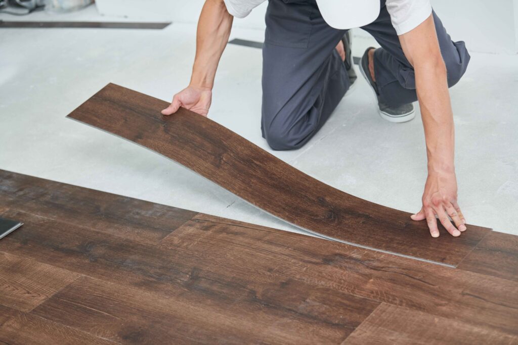 Vinyl plank peeling up at the edge in O’Fallon home
