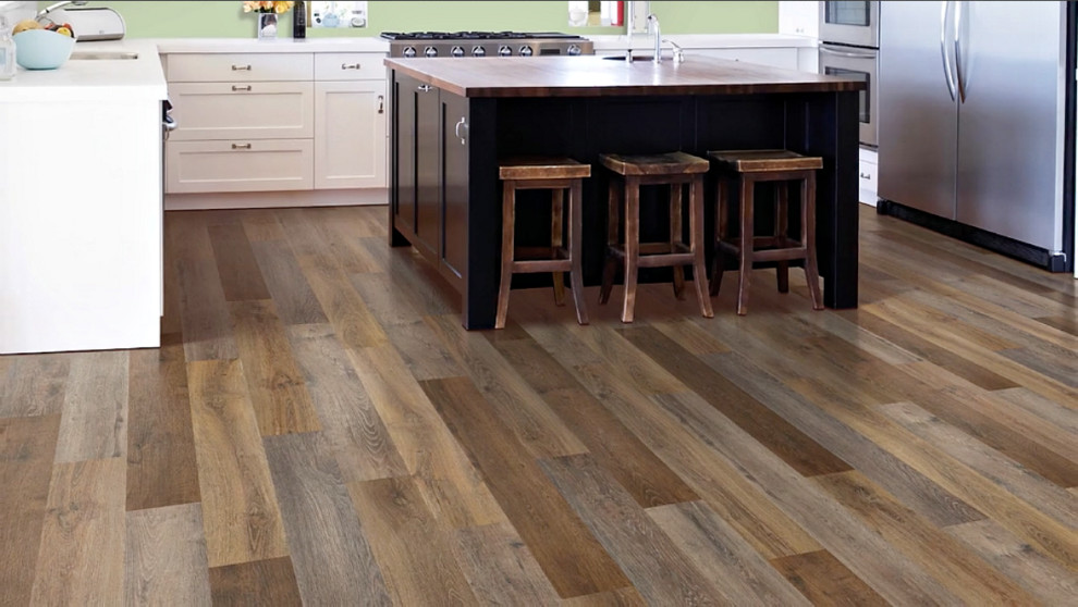 Discolored vinyl plank floor near sink in O’Fallon kitchen